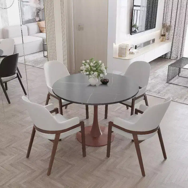 Tavolo da pranzo rotondo Bristol 40 con piano in pietra sinterizzata e base a piedistallo in acciaio noce per cucine e sale da pranzo moderne