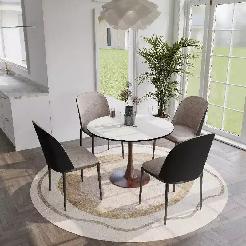 Tavolo da pranzo rotondo Bristol 40 con piano in pietra sinterizzata e base a piedistallo in acciaio noce per cucine e sale da pranzo moderne